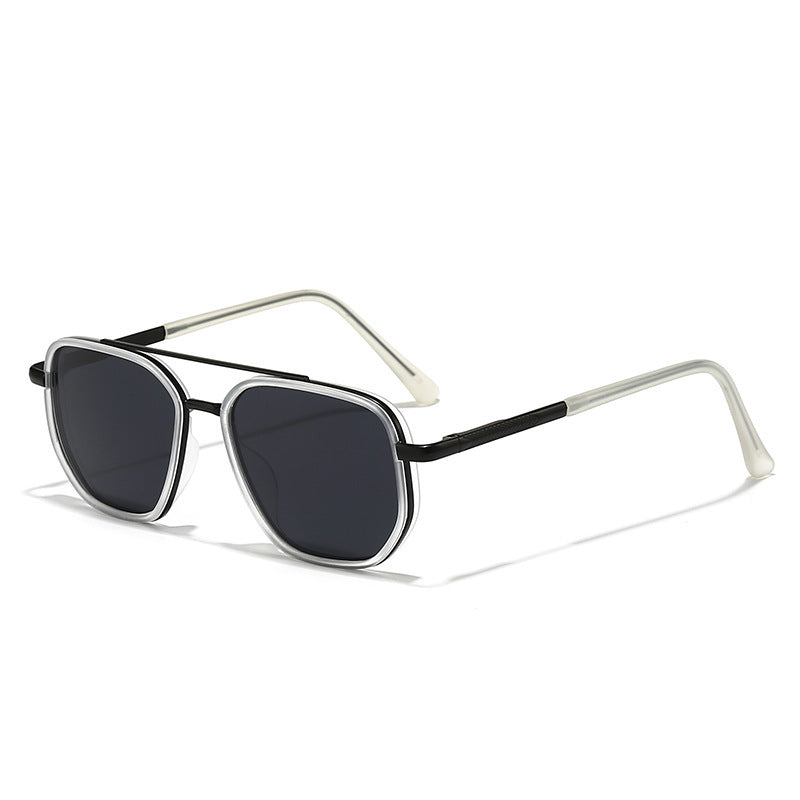 Black-and-silver metal sunglasses with dark tinted lenses and clear arms