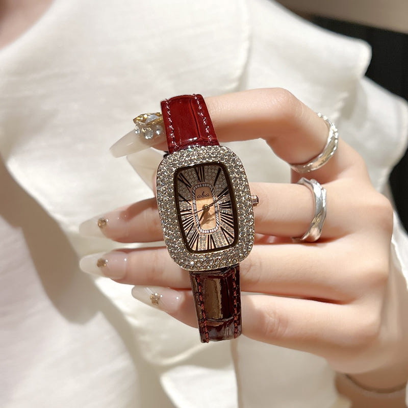 Women's diamond waterproof quartz watch with red leather-look strap and rectangular bezel