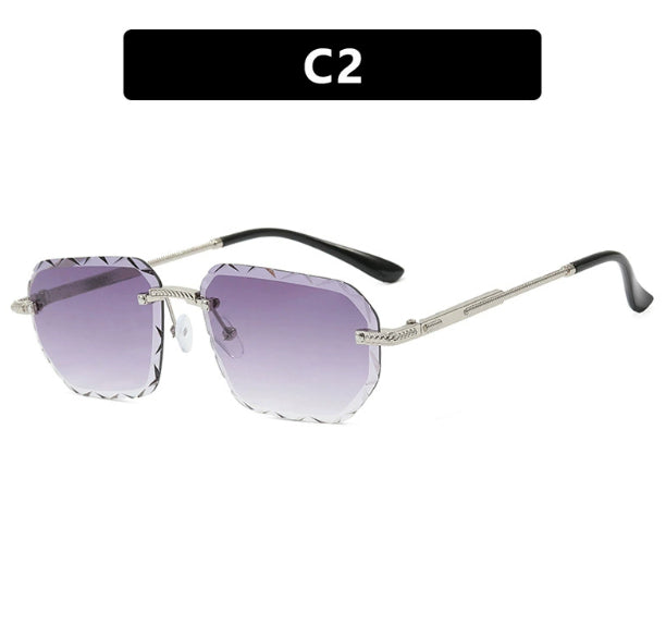 Sunglasses with gradient purple lenses and silver frame on a white background