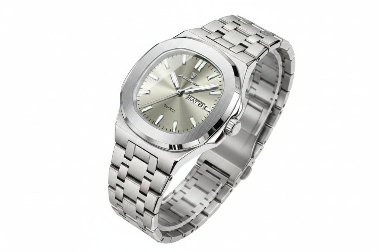 Silver watch with a metal bracelet on a beige surface, featuring a certificate of conformity.