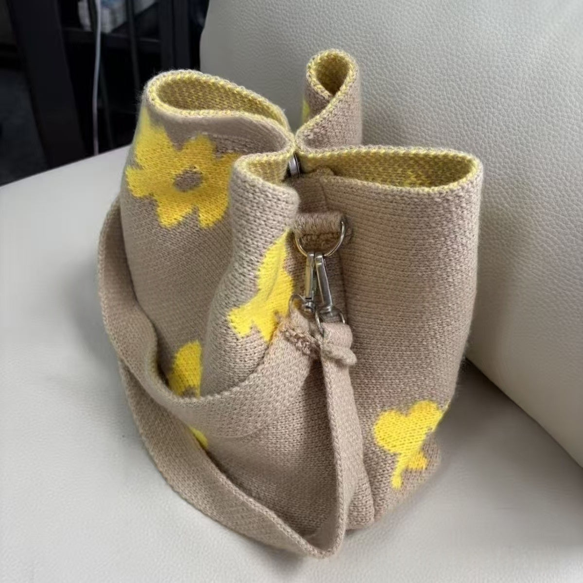 Hand-crocheted flower tote bag in beige with yellow floral appliques, tassel straps