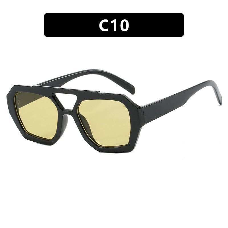 Sunglasses with black frame and yellow lenses on a white background