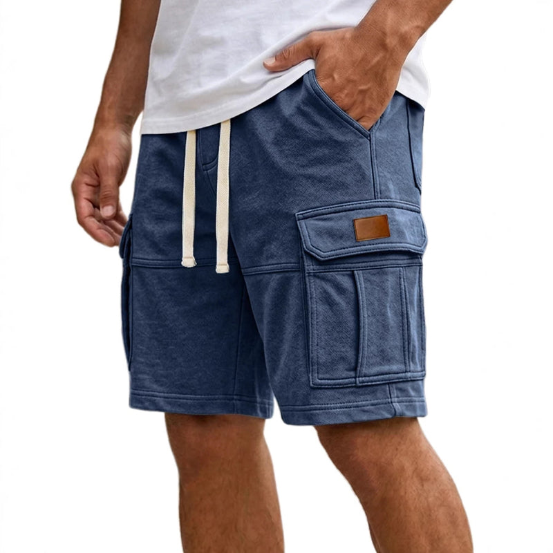 Blue cargo shorts with a white drawstring on a white background