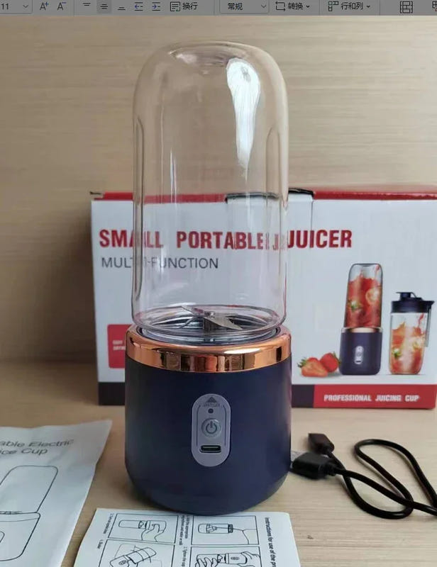 Dark blue portable USB blender with clear blending cup and six-blade base