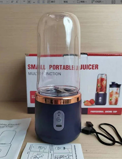 Dark blue portable USB blender with clear blending cup and six-blade base