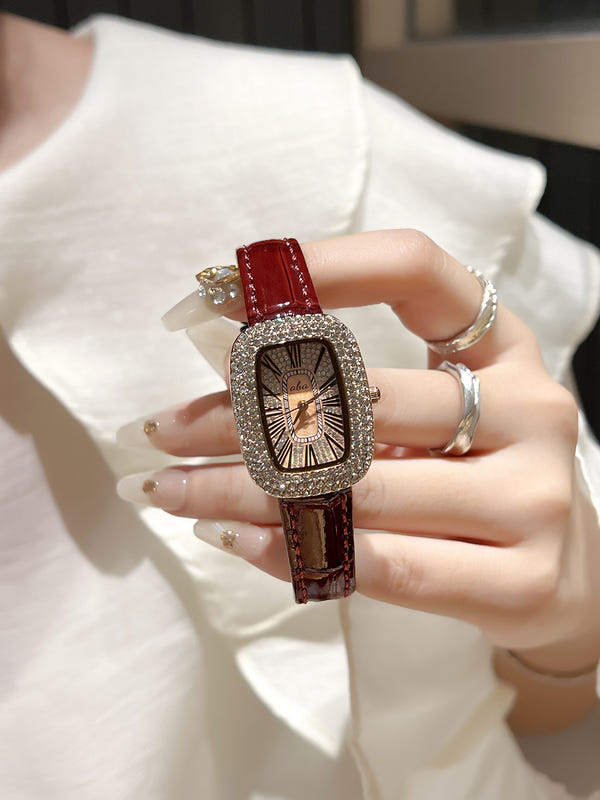 Women's diamond waterproof quartz watch with red leather-look strap and diamond-studded frame