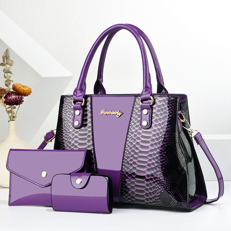 Purple shoulder tote bag with crossbody strap, scalloped texture, and matching wallet