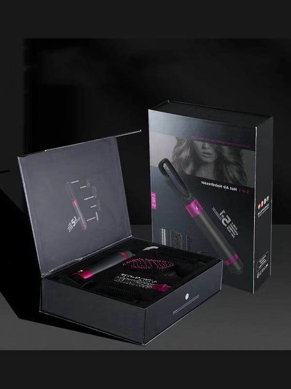 Hair dryer brush gift box with grey-and-pink styling tool displayed inside open packaging.