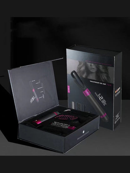 Hair dryer brush gift box with grey-and-pink styling tool displayed inside open packaging.