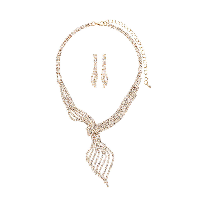 Rose gold necklace and earrings set on a white background