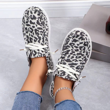 Leopard-print flat knit round-toe lace-up shoes viewed from the front, white laces