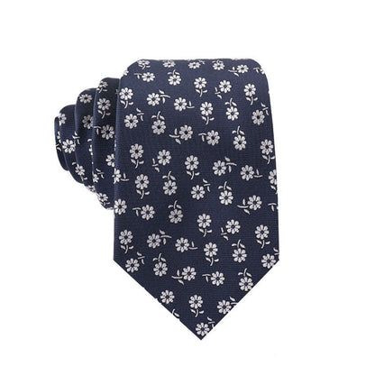 Navy blue tie with white floral pattern on a white background