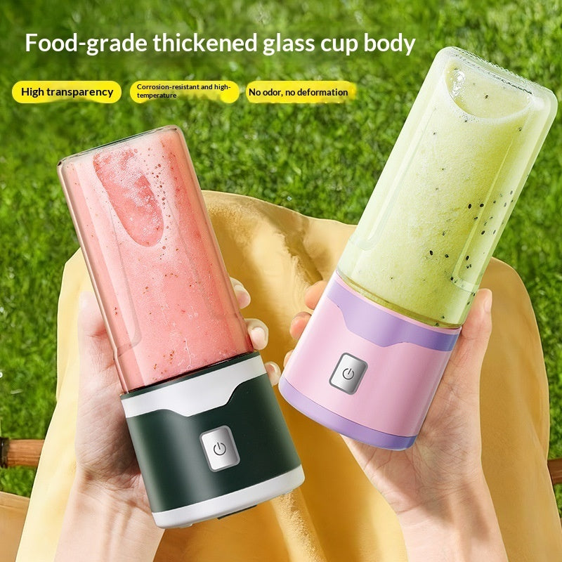 Electric USB juicer cup set with two tinted cups, holding blended juice in each cup