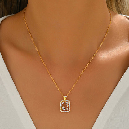 S925 sterling silver geometric rectangle necklace featuring mixed-cut D Color VVS1 moissanite stones with pave halo border in silver and gold finishes