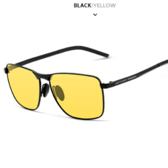 Sunglasses with yellow lenses and black frames on a white background
