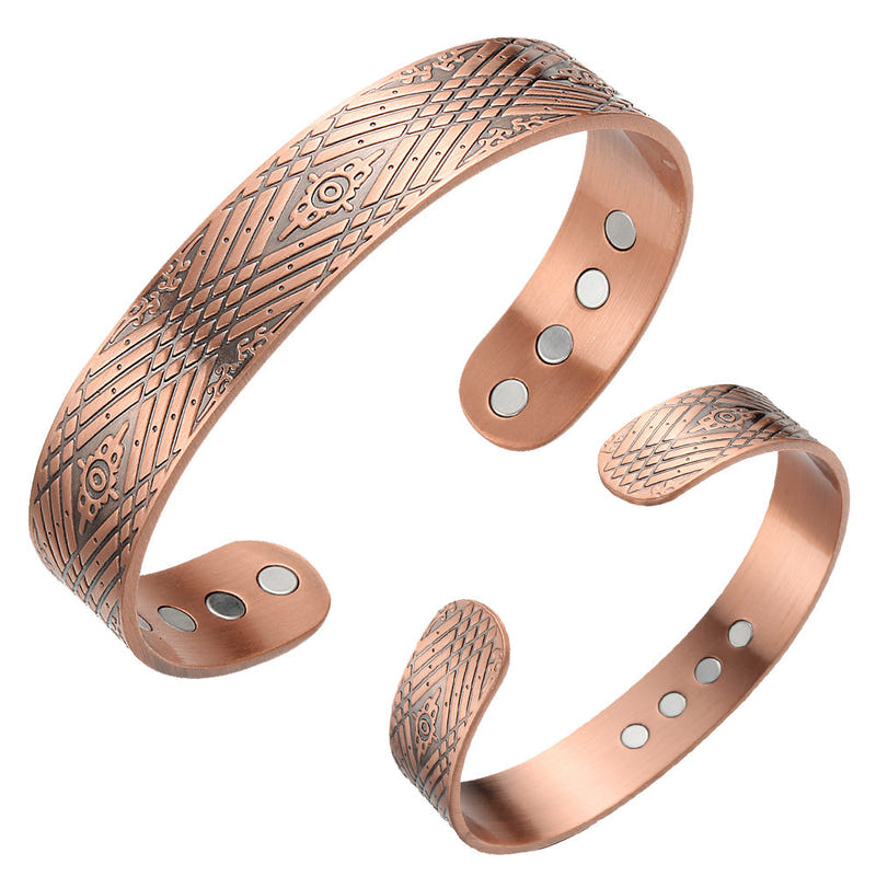 Copper tone magnetic therapy bracelet with etched pattern and four round magnet insets