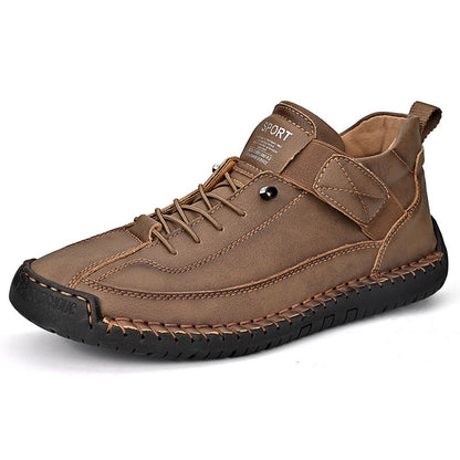 Men's mid-top leather lace-up shoe in tan-brown with lace-up closure and cushioned collar.
