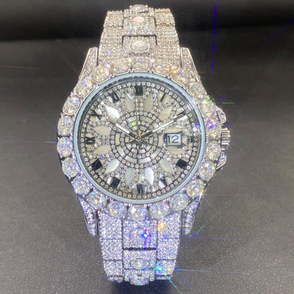 Diamond-encrusted watch with black dial and rhinestone bezel, silver-toned cuff-style strap.