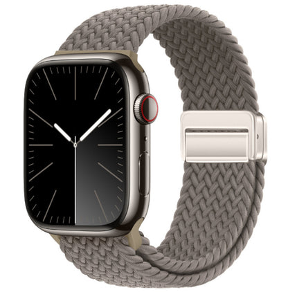 Smartwatch with a braided gray band on a white background