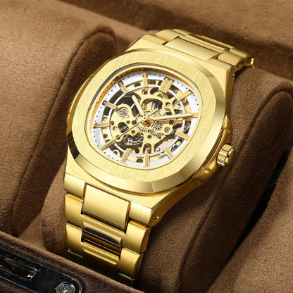 Gold wristwatch with mechanical components on a brown fabric background