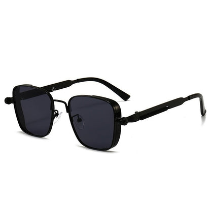 Black sunglasses with dark lenses on a white background