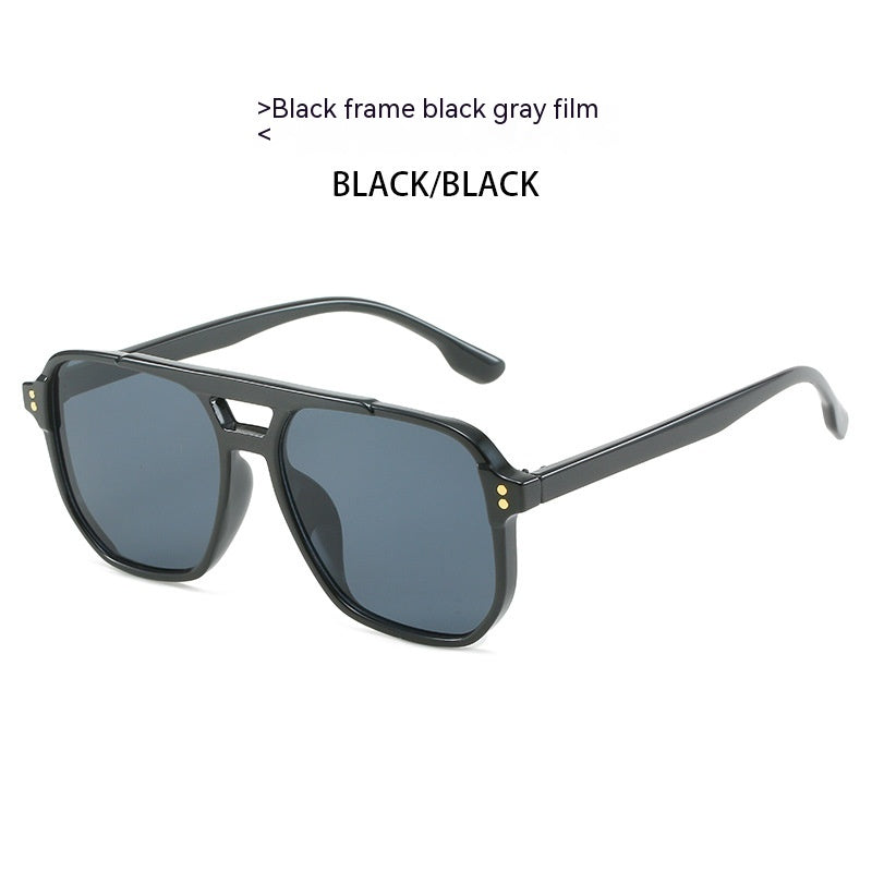 Black frame sunglasses with black gray film on a white background