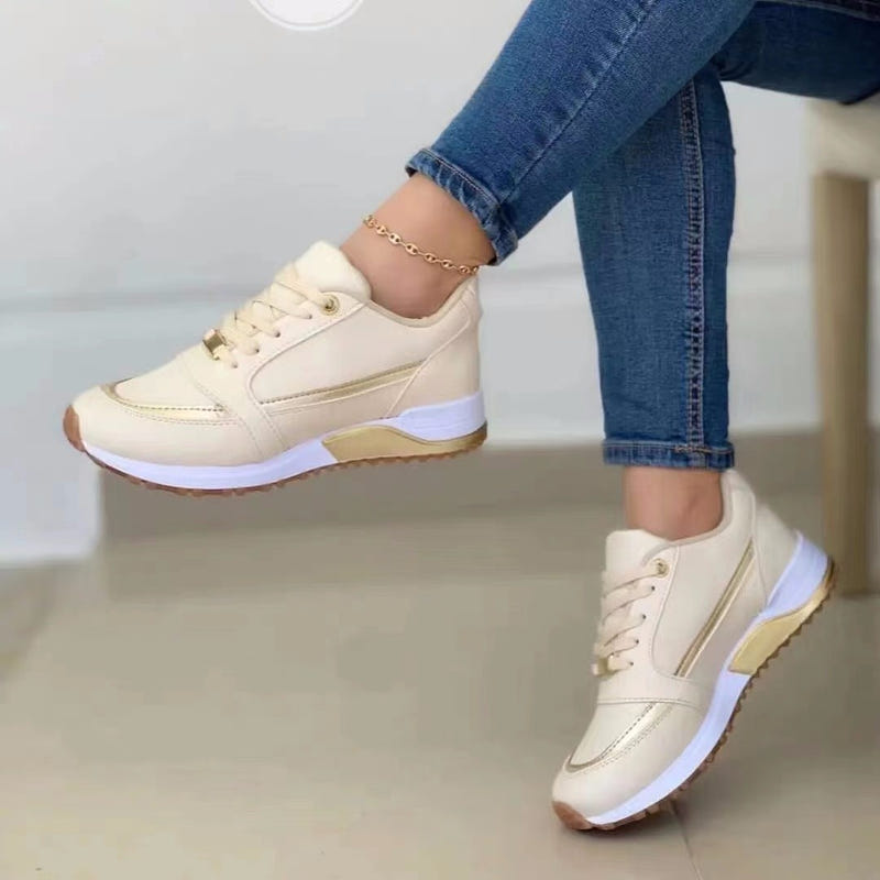 Women’s white round-toe lace-up walking sneakers with cushioned collar and sporty sole