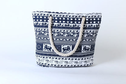 Blue and white printed canvas shoulder tote bag with rope handles