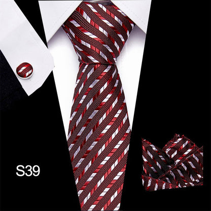 Red and white striped tie with matching pocket square on a black background