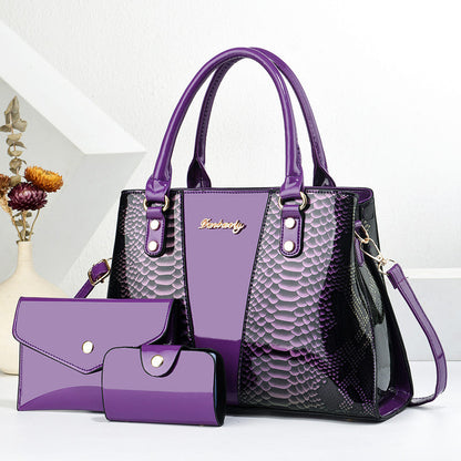 Purple shoulder tote bag with scalloped texture, front pocket, and matching wallet