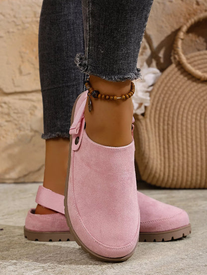 Pink round-toe slip-on flats with side strap and bead ankle bracelet