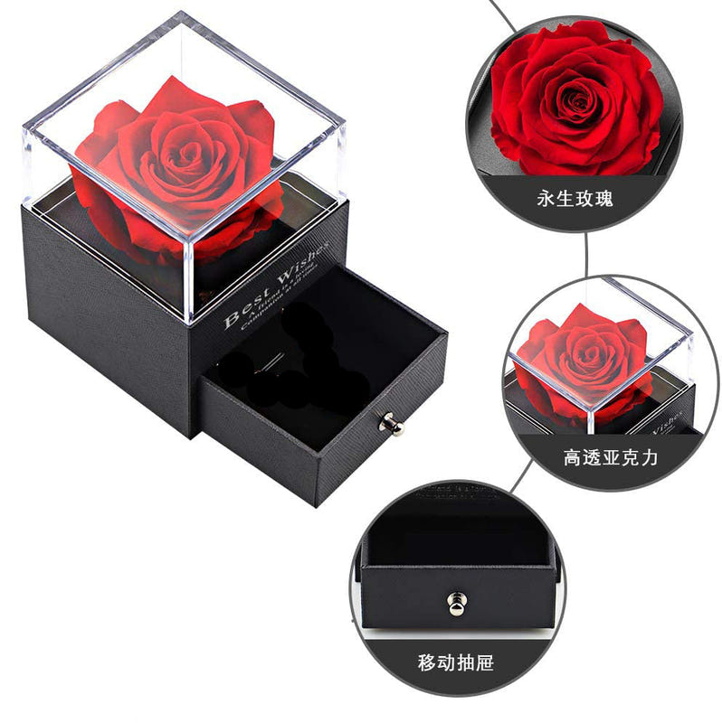 Black jewelry box with clear acrylic lid, showing a red preserved rose inside