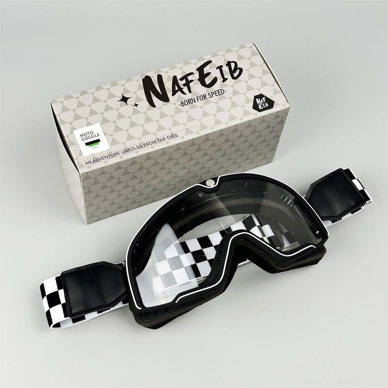 Black motorcycle goggles with mirror reflective lens and adjustable strap