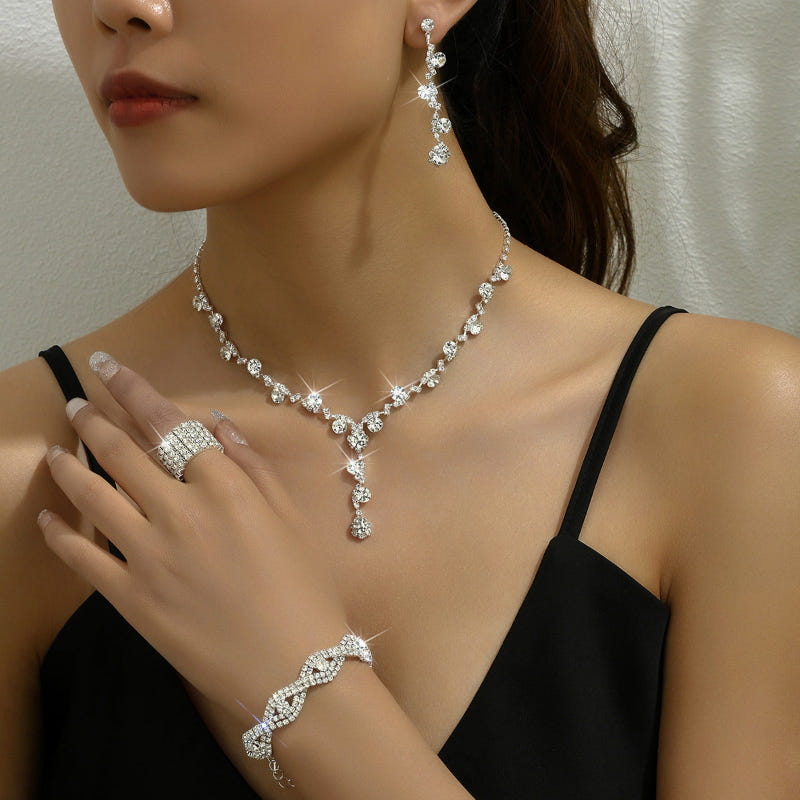 Silver-tone crystal necklace with heart pendant, drop earrings and bracelet set