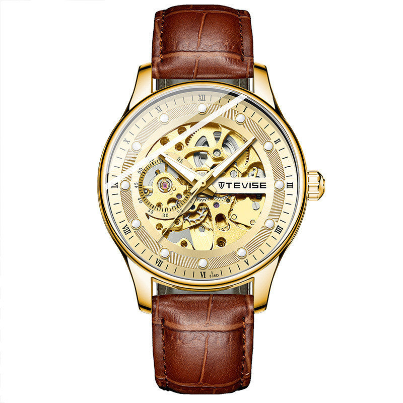 Gold mechanical watch with brown leather strap on a white background