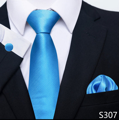 Blue tie and pocket square set with a black suit and white shirt