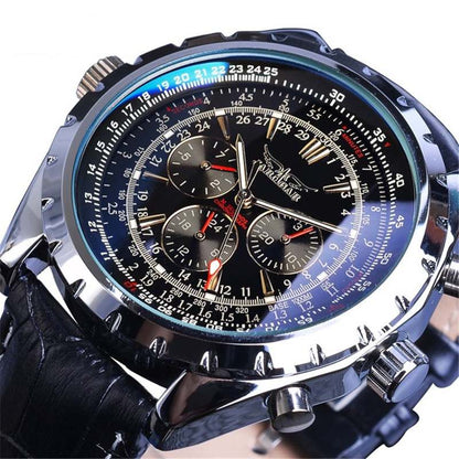 Close-up of a detailed wristwatch with multiple dials and a black strap.
