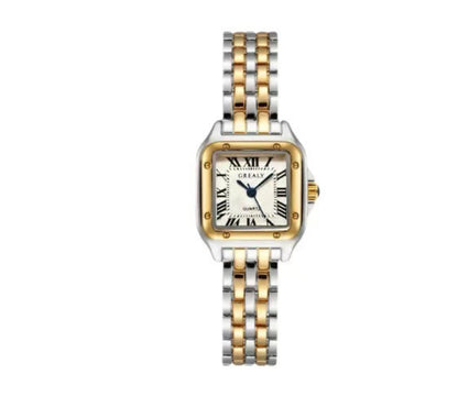 Two-tone watch with gold and silver band on a white background