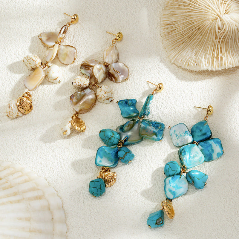 Blue and white shell starfish charm earrings with gold-tone accents