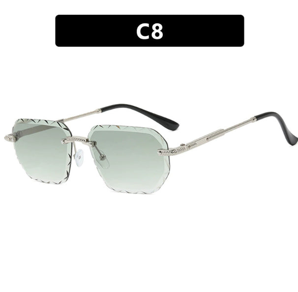 Sunglasses with gradient lenses and thin metal frame on a white background