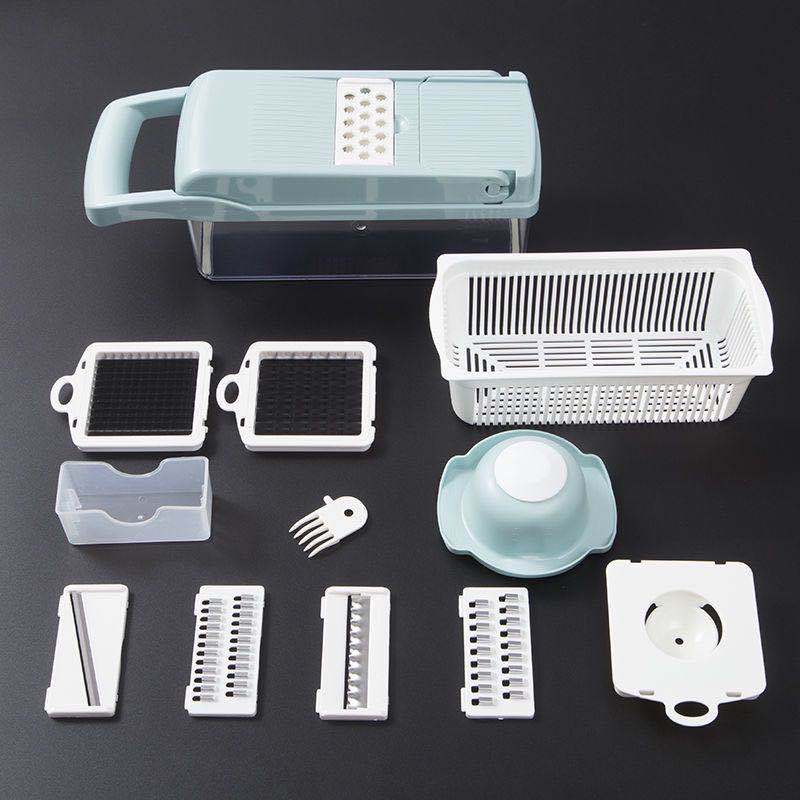 Multifunctional vegetable cutter set with light blue base and removable black blades