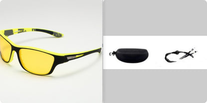 Yellow safety glasses with black frames on a white background, accompanied by a black case and strap.