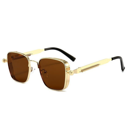 Gold-framed sunglasses with brown lenses on a white background