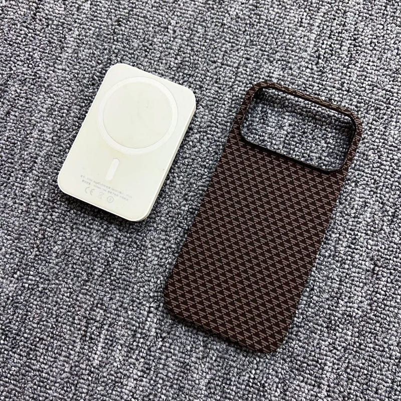 Magnetic iPhone case with brown check pattern and rectangular camera cutout