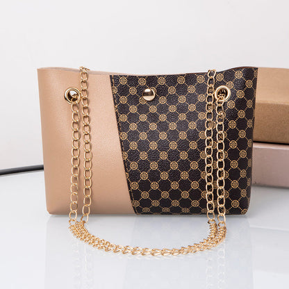 Two-tone dotted print chain shoulder bag with gold-tone hardware and long chain strap
