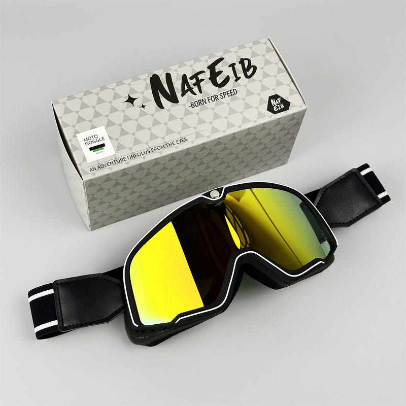 Sporty motorcycle goggles with black frame and yellow mirrored lens, adjustable strap