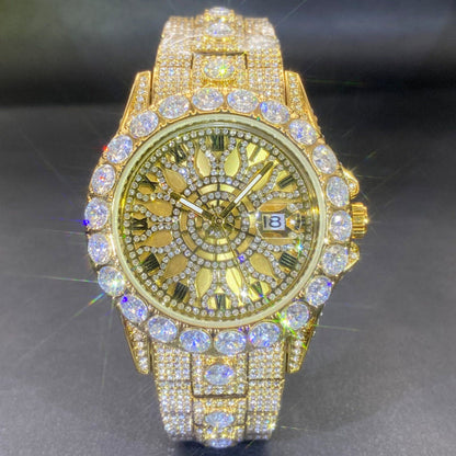 Diamond-encrusted watch with gold case, green-gold dial, and chunky gold link strap.
