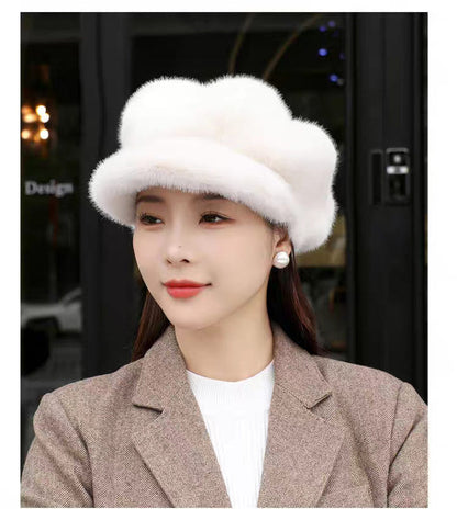 White faux-fur pumpkin hat with curved brim and soft ear-covering shape