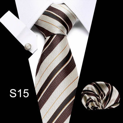 Striped tie with matching pocket square and cufflinks on a white background