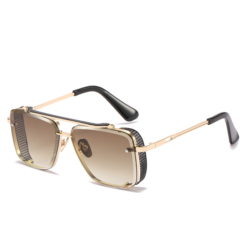 Gold-framed sunglasses with black accents on a white background